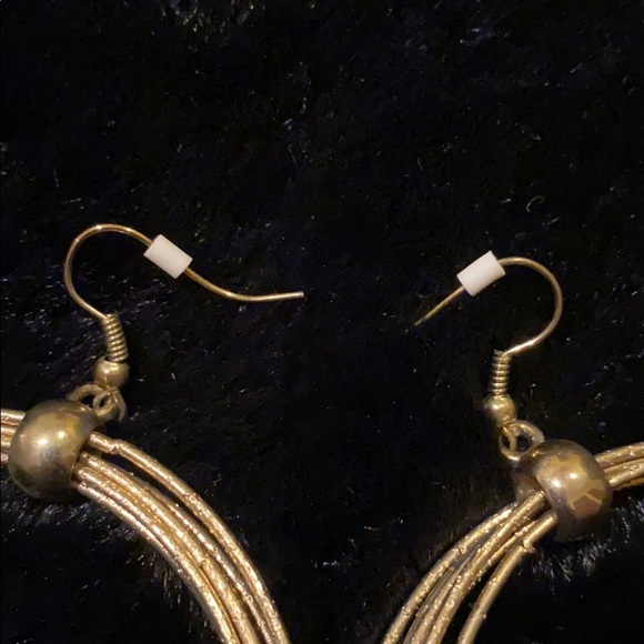 Fuego Gold Tone Hoop Earrings - Picture 3 of 6